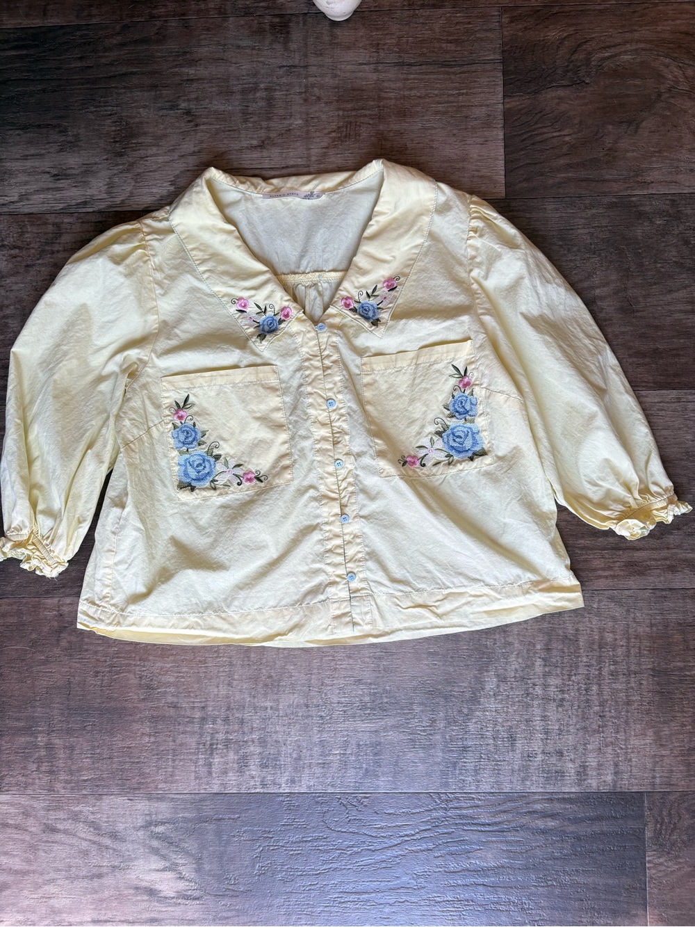 Altar'd State Pale Yellow Cropped Button-Up Blouse with Blue Floral Embroidery